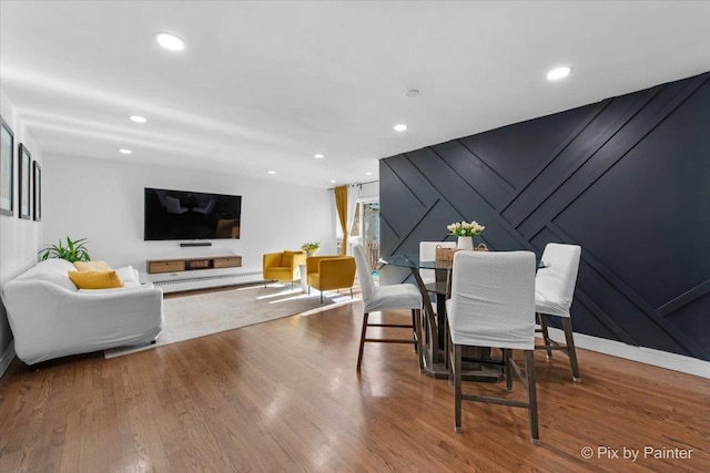 3121 Paris Ave Unit 304, River Grove, IL 60171 - dining room featuring wood finished floors, recessed lighting, a decorative wall, and baseboards