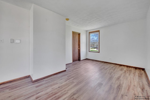 337 George Ave, Waukegan, IL 60085 - unfurnished room featuring light wood-type flooring and baseboards