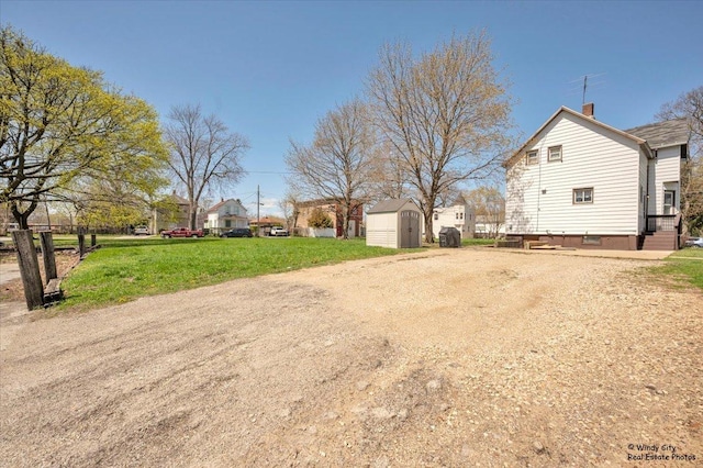 337 George Ave, Waukegan, IL 60085 - view of green lawn featuring a shed and an outdoor structure