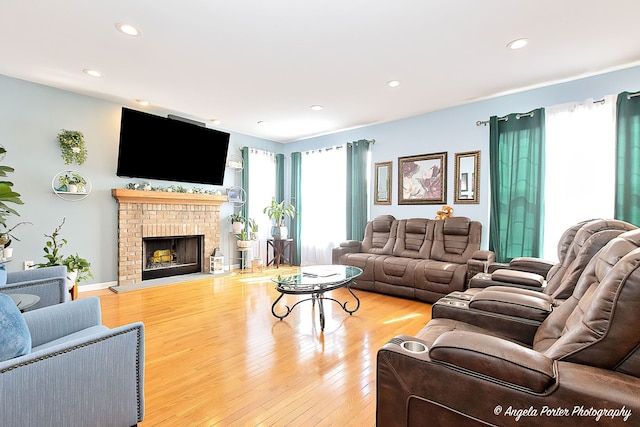 3123 Concord Ln, Wadsworth, IL 60083 - living area with hardwood / wood-style flooring, recessed lighting, and a fireplace