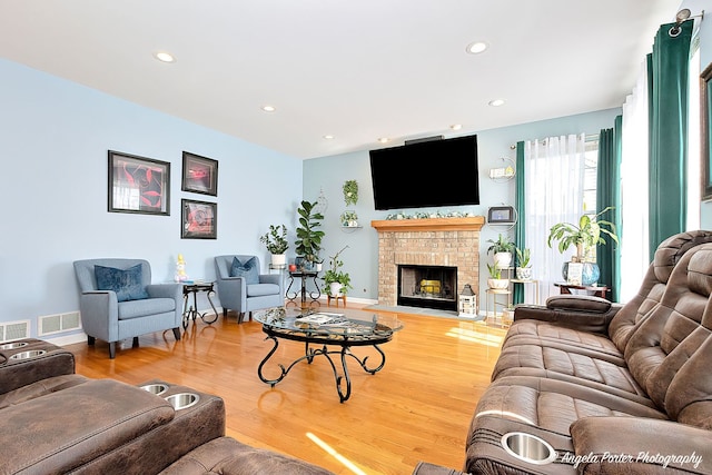 3123 Concord Ln, Wadsworth, IL 60083 - living room featuring recessed lighting, wood finished floors, a fireplace, and baseboards