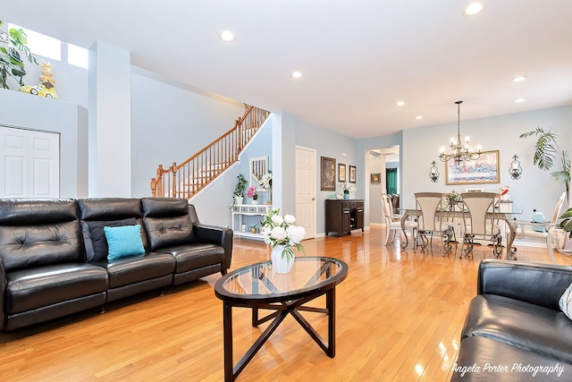 3123 Concord Ln, Wadsworth, IL 60083 - living room with recessed lighting, light wood finished floors, stairs, and a chandelier