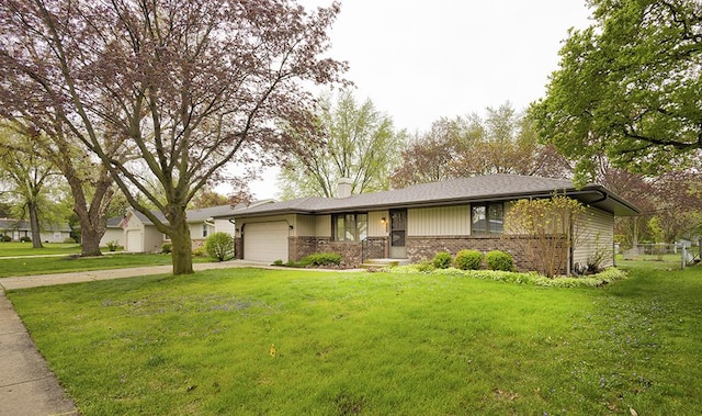 ranch-style house featuring an attached garage, brick siding, concrete driveway, and a chimney