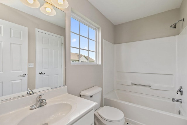 full bathroom with  shower combination, toilet, and vanity