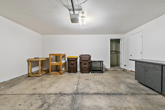 garage featuring a garage door opener