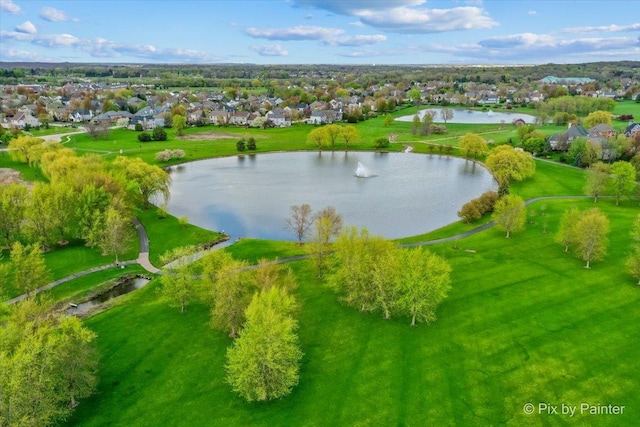 aerial view of residential area with a nearby body of water