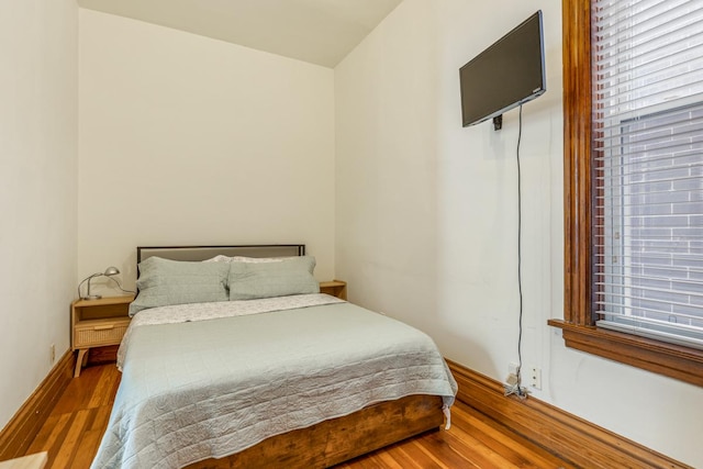 3809 N Kenmore Ave, Chicago, IL 60613 - bedroom featuring wood finished floors and baseboards