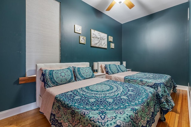 3809 N Kenmore Ave, Chicago, IL 60613 - bedroom featuring wood finished floors, baseboards, and ceiling fan