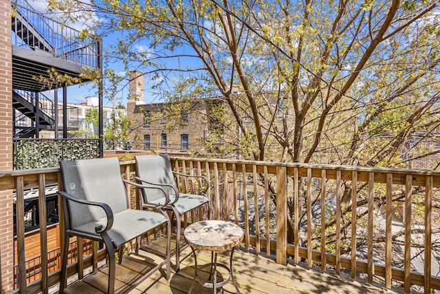 3809 N Kenmore Ave, Chicago, IL 60613 - wooden deck featuring stairway