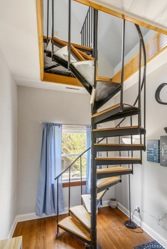 3809 N Kenmore Ave, Chicago, IL 60613 - stairway featuring hardwood / wood-style flooring and baseboards