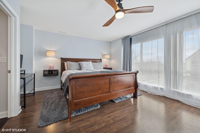 684 Diamond Pointe Dr, Mundelein, IL 60060 - bedroom featuring multiple windows, wood finished floors, baseboards, and ceiling fan