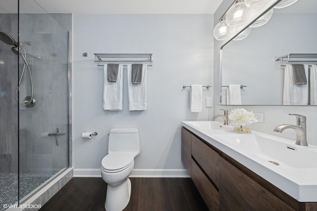 684 Diamond Pointe Dr, Mundelein, IL 60060 - full bath with baseboards, a tile shower, wood finished floors, toilet, and double vanity