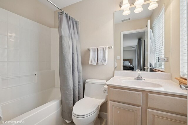 684 Diamond Pointe Dr, Mundelein, IL 60060 - ensuite bathroom with vanity, toilet, shower / bath combo with shower curtain, and a chandelier