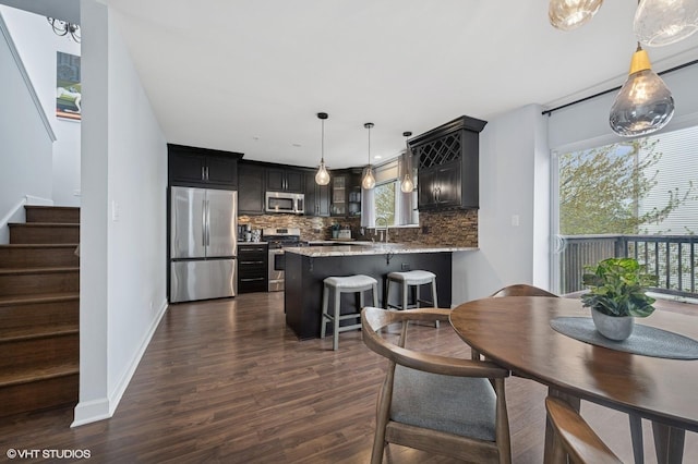 684 Diamond Pointe Dr, Mundelein, IL 60060 - dining room with dark wood-type flooring, stairway, and baseboards