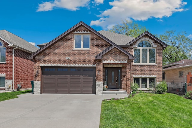 8545 Parkside Ave, Burbank, IL 60459 - view of front facade featuring driveway, brick siding, a garage, and stone siding