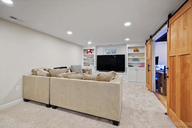 20 S Cambridge Dr, Geneva, IL 60134 - living area with a barn door, light carpet, recessed lighting, and baseboards