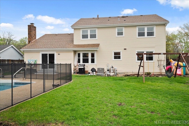20 S Cambridge Dr, Geneva, IL 60134 - back of house with a patio, a chimney, and roof with shingles