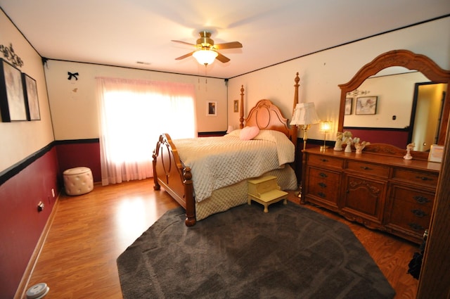 815 Meadow Rdg Unit 2, New Lenox, IL 60451 - bedroom with wood finished floors, ceiling fan, and baseboards