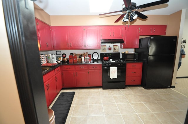 815 Meadow Rdg Unit 2, New Lenox, IL 60451 - kitchen featuring black appliances, under cabinet range hood, red cabinetry, a ceiling fan, and dark countertops