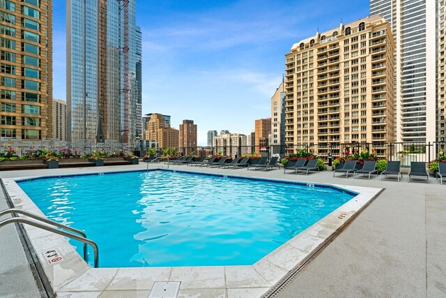 30 E Huron St Unit 1110, Chicago, IL 60611 - community pool featuring a city view