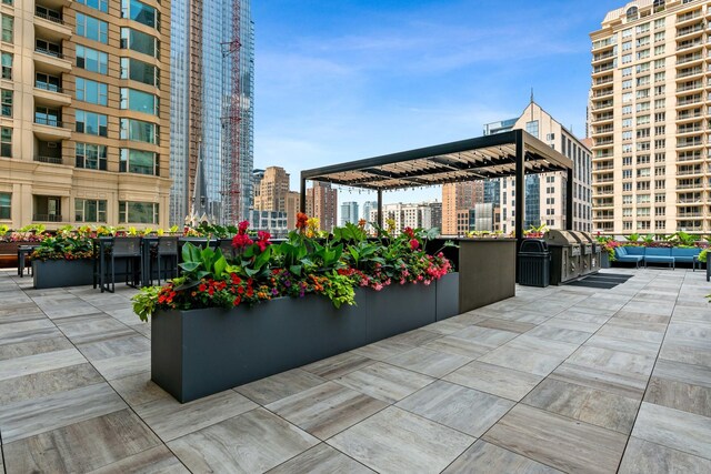 30 E Huron St Unit 1110, Chicago, IL 60611 - view of patio / terrace featuring a city view and an outdoor hangout area