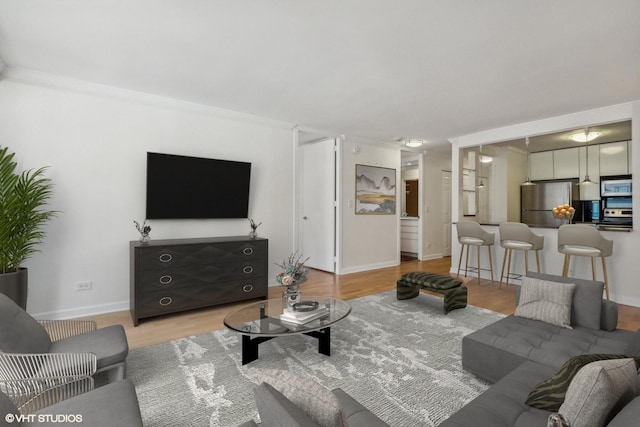 30 E Huron St Unit 1110, Chicago, IL 60611 - living room featuring light wood-type flooring and baseboards