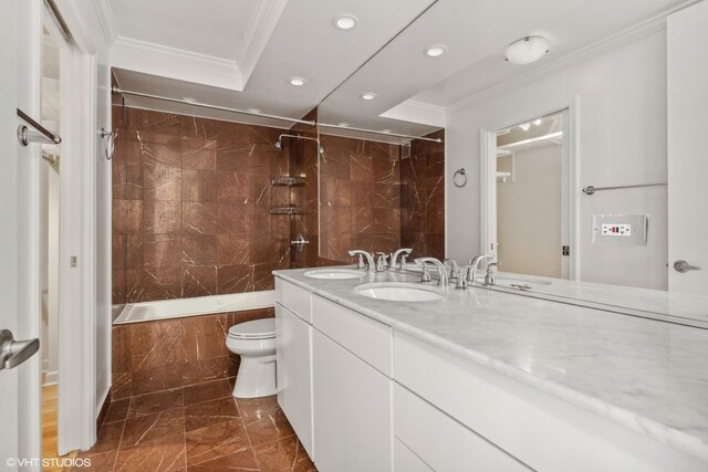 30 E Huron St Unit 1110, Chicago, IL 60611 - bathroom featuring a combined bath / shower with marble appearance, ornamental molding, recessed lighting, double vanity, and toilet
