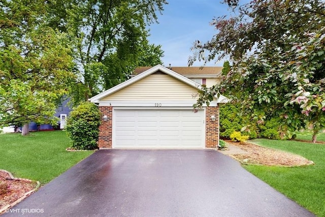 190 Washo Ct, Lake Zurich, IL 60047 - view of front of house featuring brick siding, driveway, and a front yard