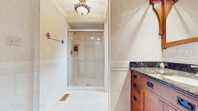 190 Washo Ct, Lake Zurich, IL 60047 - bathroom with vanity, a shower stall, tile patterned floors, and tile walls