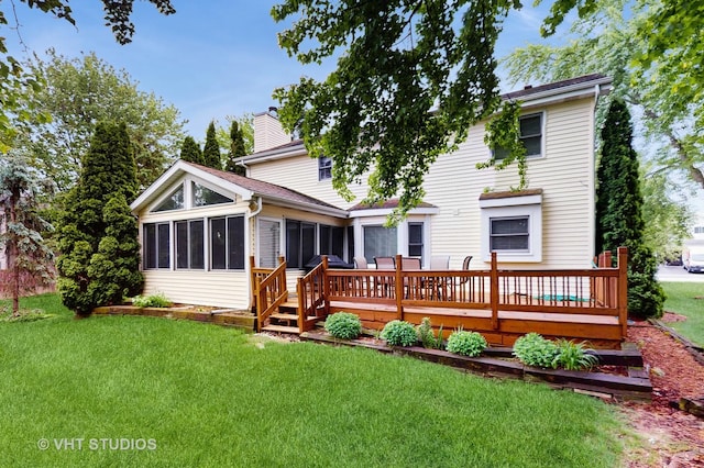 190 Washo Ct, Lake Zurich, IL 60047 - rear view of house with a chimney, a sunroom, a deck, and a lawn