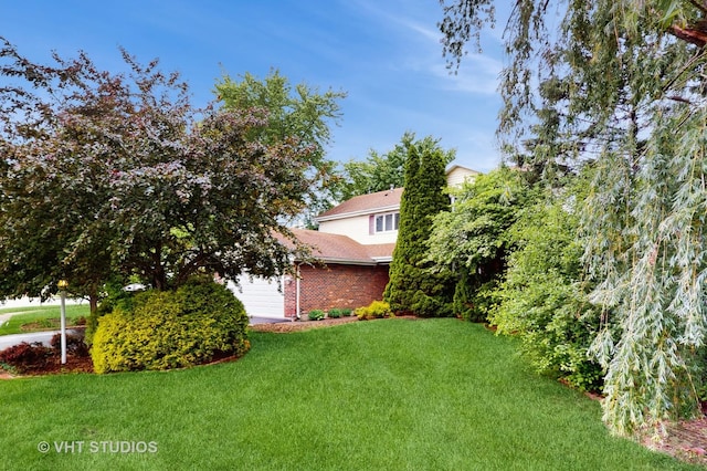 190 Washo Ct, Lake Zurich, IL 60047 - view of green lawn with an attached garage
