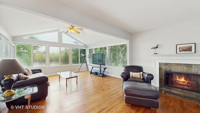 190 Washo Ct, Lake Zurich, IL 60047 - living area with a ceiling fan, wood finished floors, vaulted ceiling, a glass covered fireplace, and baseboards