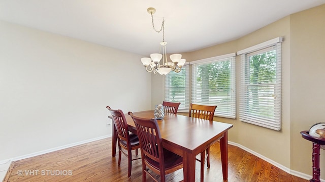 190 Washo Ct, Lake Zurich, IL 60047 - dining space featuring wood finished floors, a chandelier, and baseboards