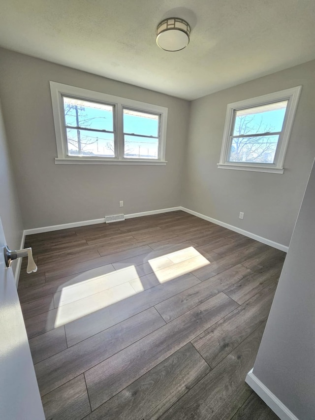 23530 W Gagne Ln, Plainfield, IL 60586 - spare room featuring wood finished floors and baseboards