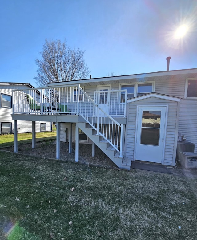 23530 W Gagne Ln, Plainfield, IL 60586 - rear view of property with stairway, a yard, and a wooden deck
