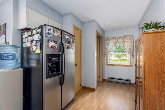 2651 E 2900 N Rd, Ancona, IL 61311 - kitchen featuring stainless steel fridge with ice dispenser, a baseboard heating unit, light wood-style floors, white cabinetry, and baseboards