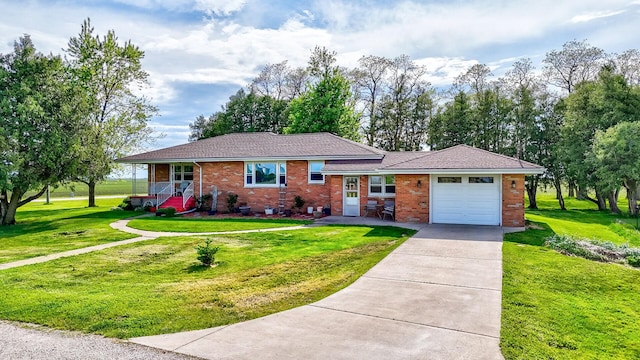 2651 E 2900 N Rd, Ancona, IL 61311 - view of front of property with a garage, driveway, a front yard, and brick siding