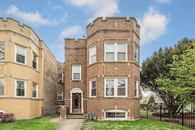 view of front of house with brick siding