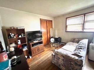 7502 W 64th St, Summit, IL 60501 - living area with wood finished floors and a desk