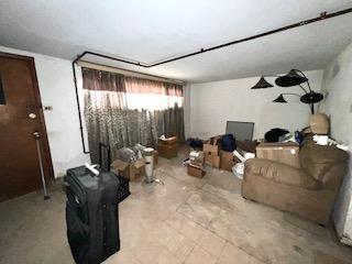 7502 W 64th St, Summit, IL 60501 - living area with a wood stove