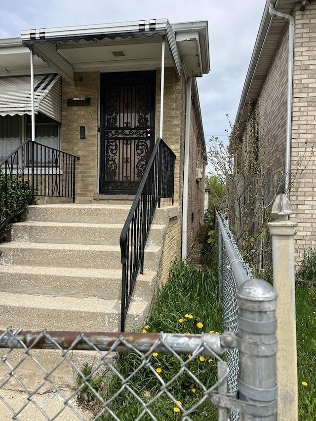 7502 W 64th St, Summit, IL 60501 - property entrance with fence and brick siding