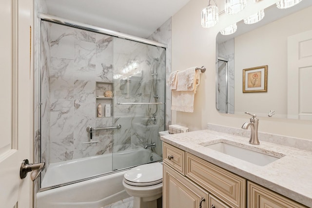 full bathroom with toilet, enclosed tub / shower combo, and vanity