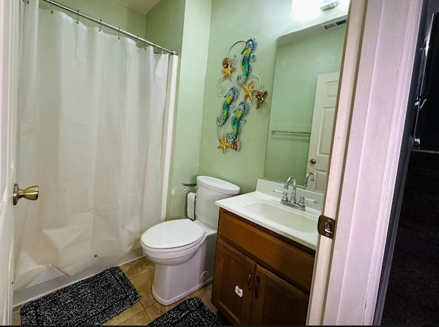 815 S Oak St, West Chicago, IL 60185 - full bathroom with tile patterned floors, vanity, toilet, and a shower with curtain