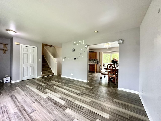 815 S Oak St, West Chicago, IL 60185 - living room with stairway, wood finished floors, and baseboards