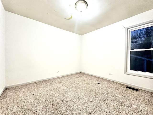 815 S Oak St, West Chicago, IL 60185 - carpeted spare room with baseboards
