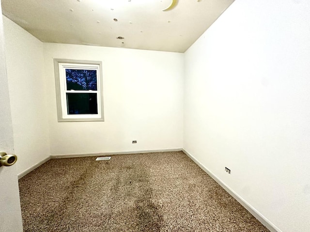 815 S Oak St, West Chicago, IL 60185 - carpeted spare room with baseboards