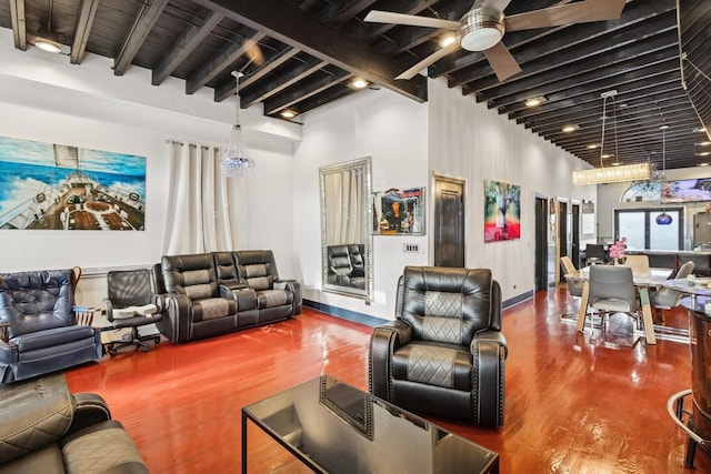 5127 S Artesian Ave, Chicago, IL 60632 - living area with wood finished floors, ceiling fan, beamed ceiling, and a towering ceiling