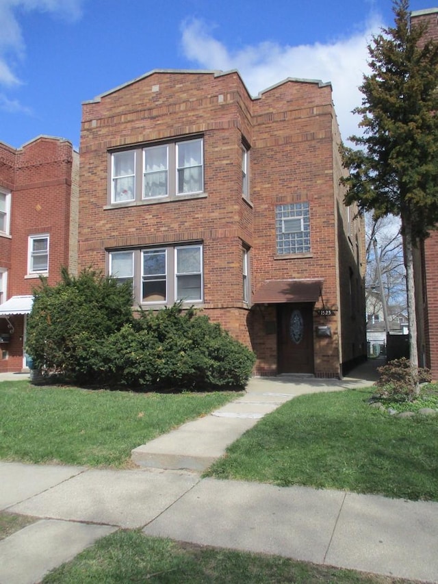 1525 Gunderson Ave, Berwyn, IL 60402 - view of front facade featuring brick siding and a front yard