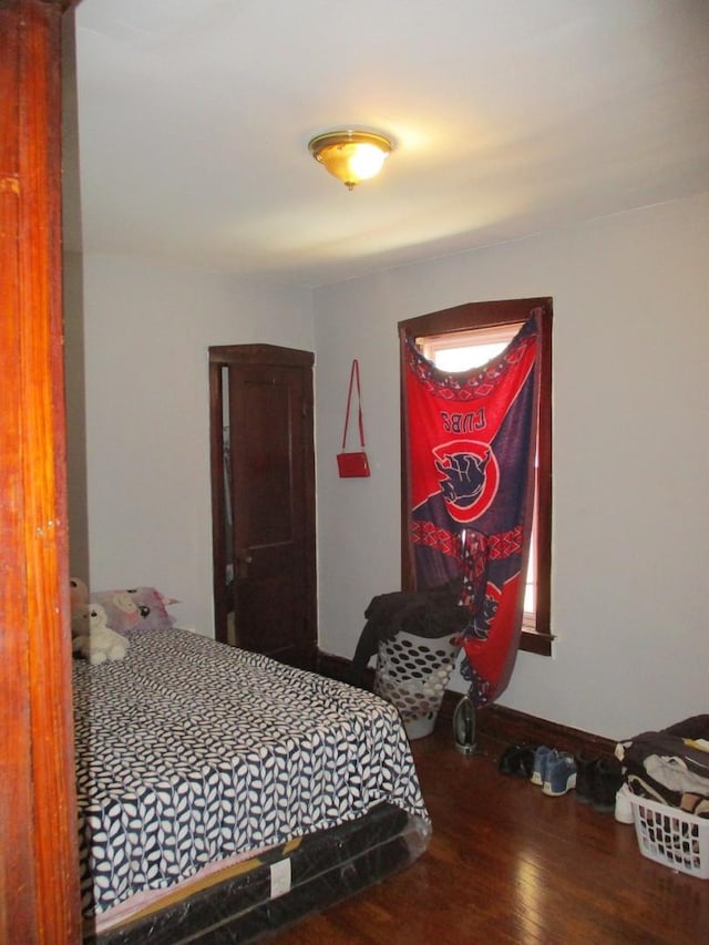1525 Gunderson Ave, Berwyn, IL 60402 - bedroom featuring wood finished floors and baseboards
