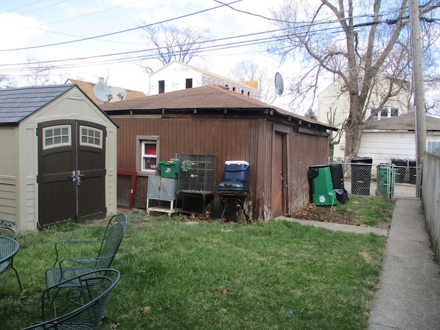 1525 Gunderson Ave, Berwyn, IL 60402 - rear view of property featuring an outdoor structure and a storage shed